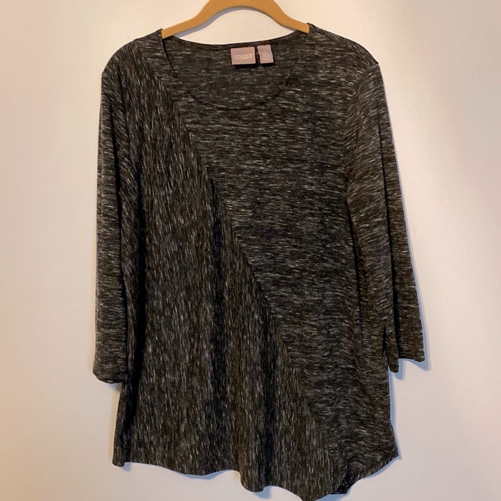 Chico’s size 2, which is large in regular size.  Machine wash, tumble dry.
